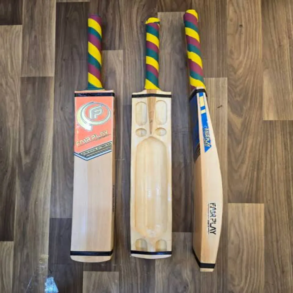 Trio of 11Sports Fair Play wooden tennis cricket bats with spiral yellow, green, and maroon handle grips.