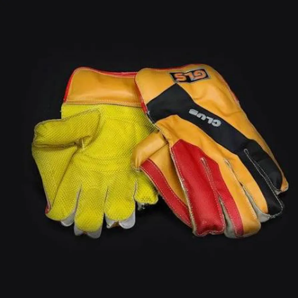 11Sports yellow, black, and red match wicket keeping gloves set on a dark backdrop showing yellow pimple grip.