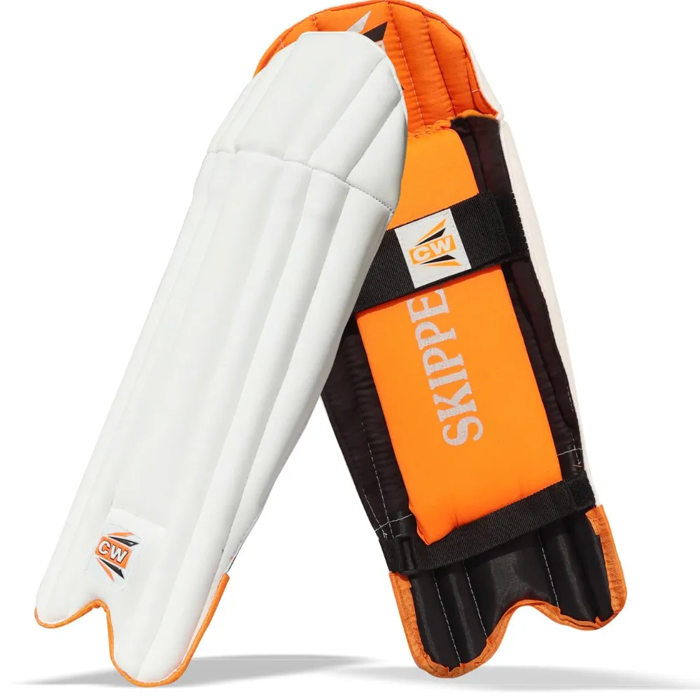 11Sports white cricket wicket keeping pads with high-visibility bright orange interior padding and straps.