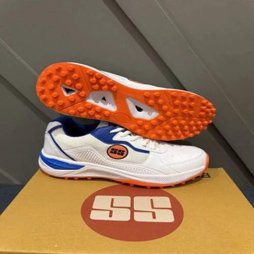 11Sports SS white, blue, and orange cricket turf shoes resting atop their branded shoebox.