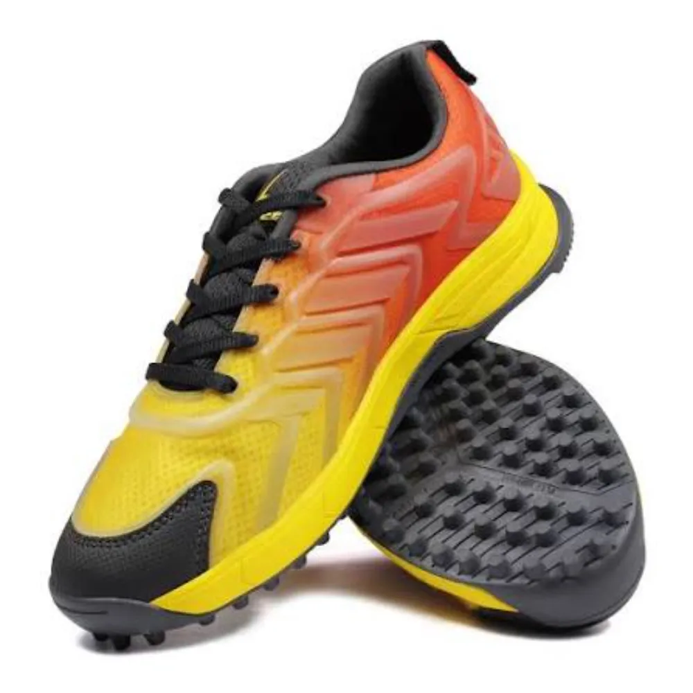 11Sports orange and yellow gradient rubber turf cricket shoe showcasing multi-directional lug sole.
