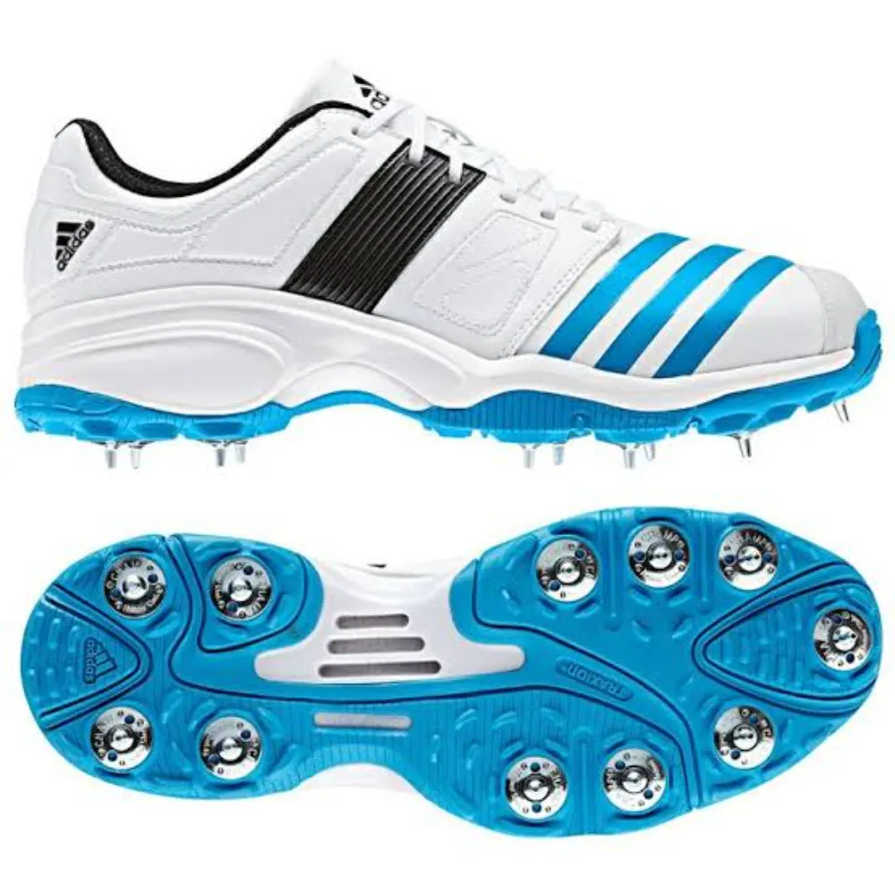 Profile and bottom outsole view of 11Sports white and cyan blue cricket spikes with steel metal studs.